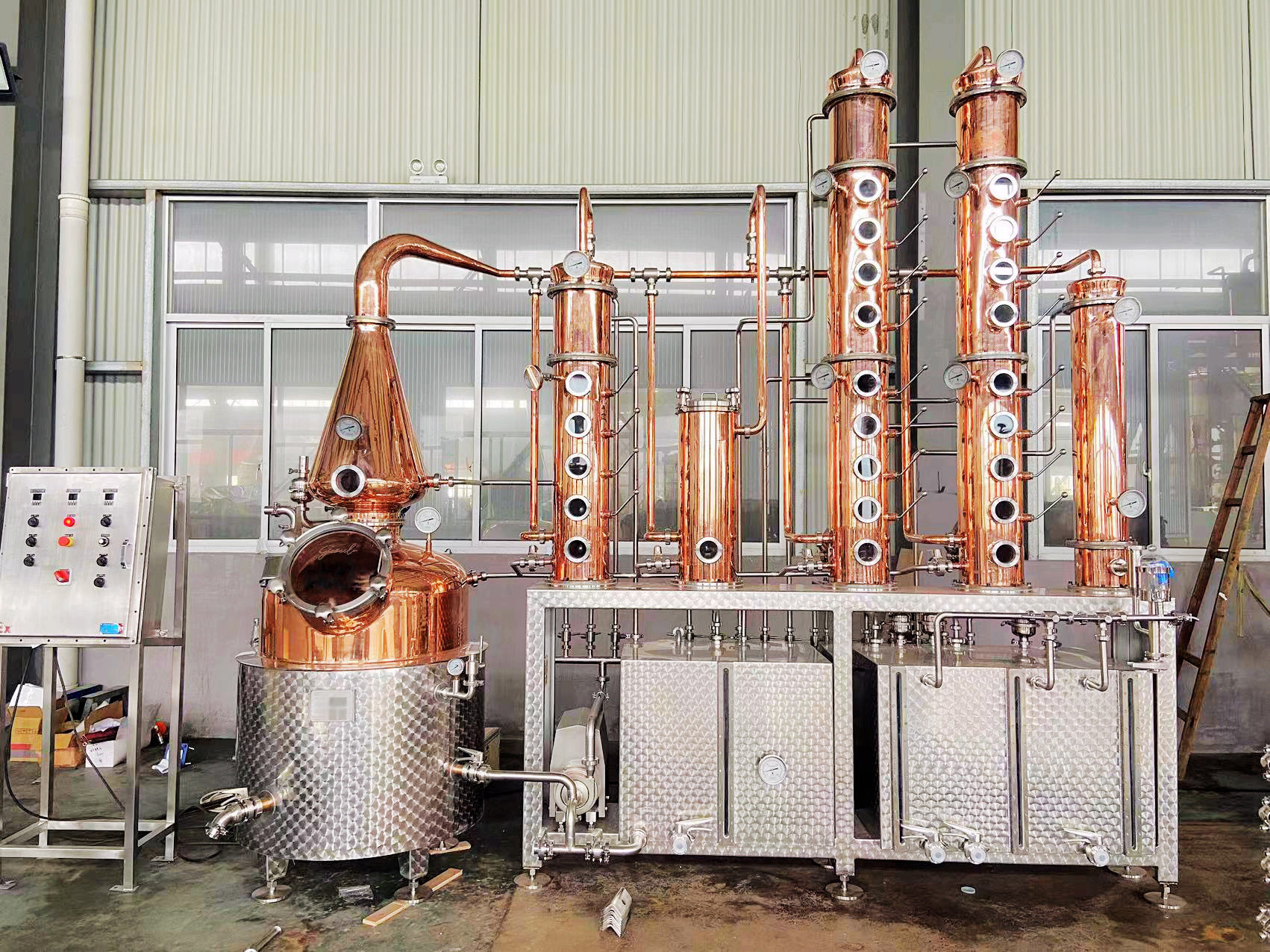 What is the essential equipment of a distillery?